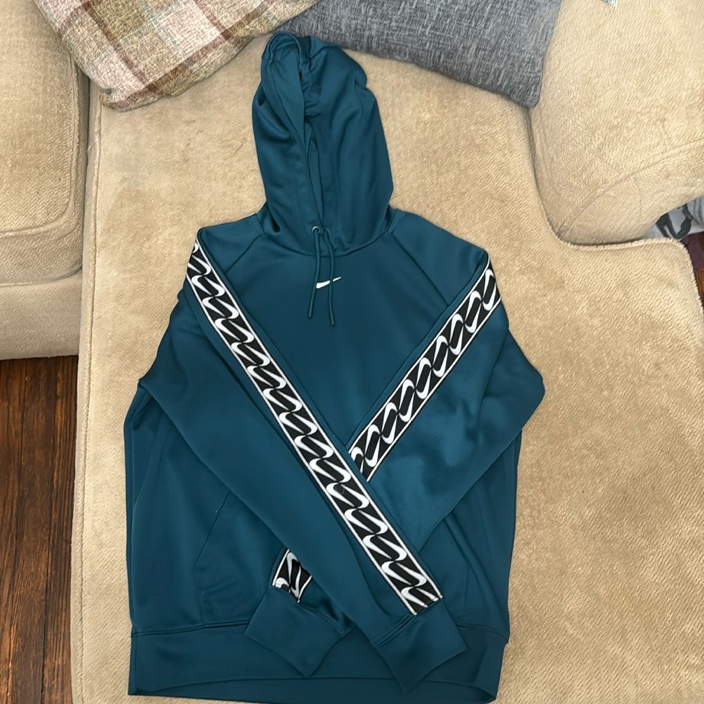 Woman’s Green Nike hoodie